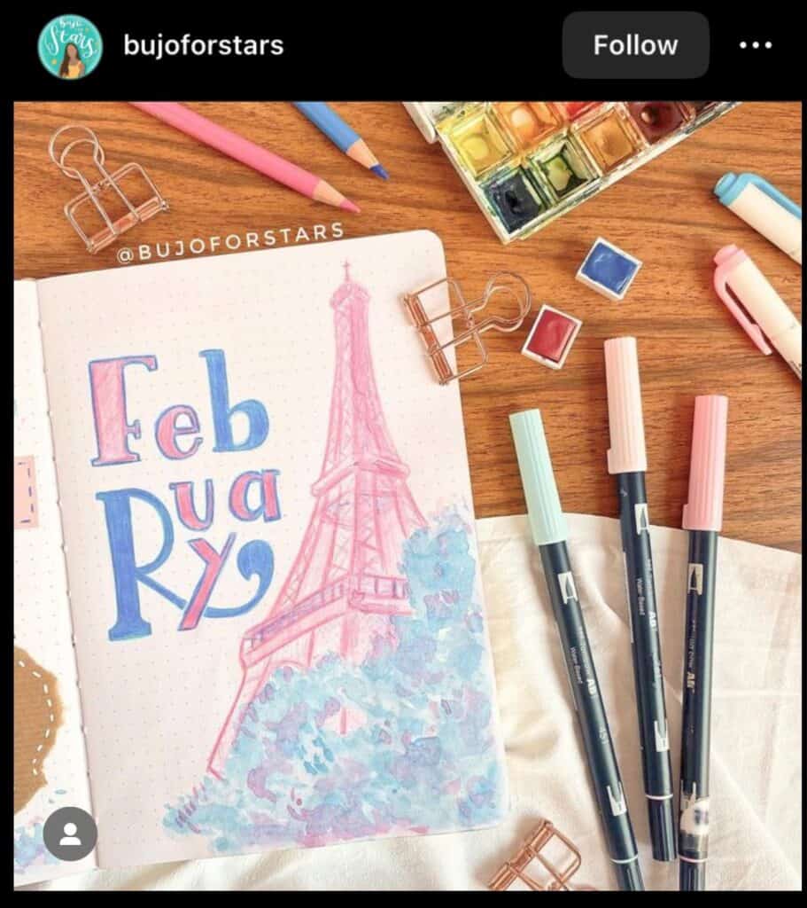 pink february bullet journal cover spread with eiffel tower